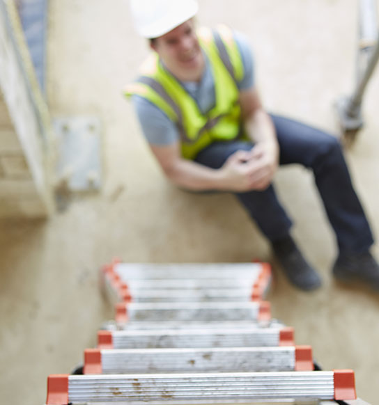 Worker hurting his knee on the job